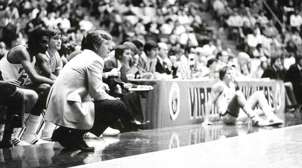 Holland retired as the all-time winningest men's basketball coach in program history