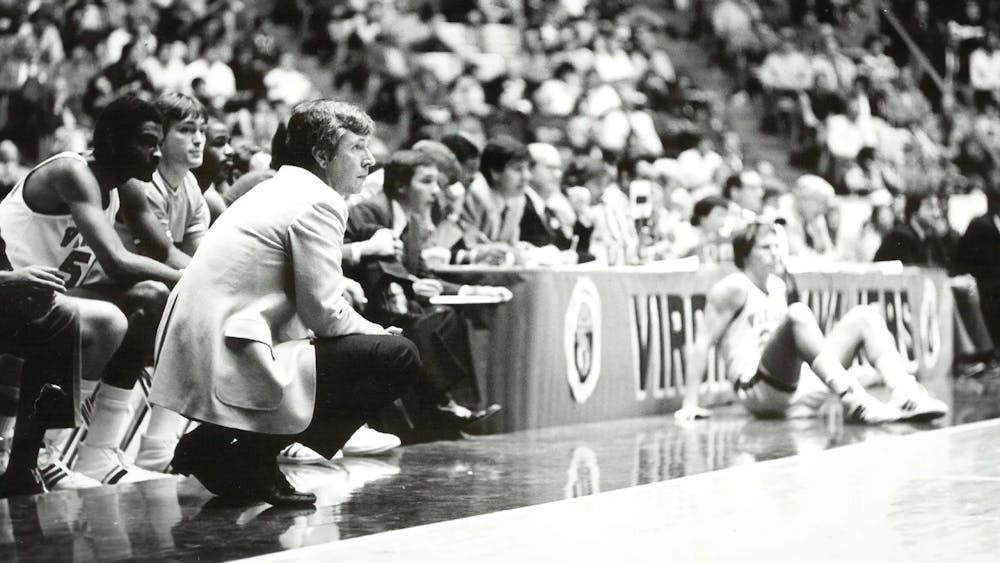 Holland retired as the all-time winningest men's basketball coach in program history