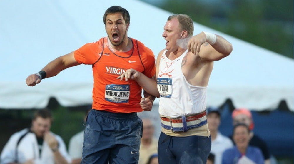 <p>Sophomore throwers Filip Mihaljevic (left) and Jordan Young starred this weekend at Lannigan Field. Mihaljevic became the first Cavalier to exceed the 20-meter mark in the shot put. </p>