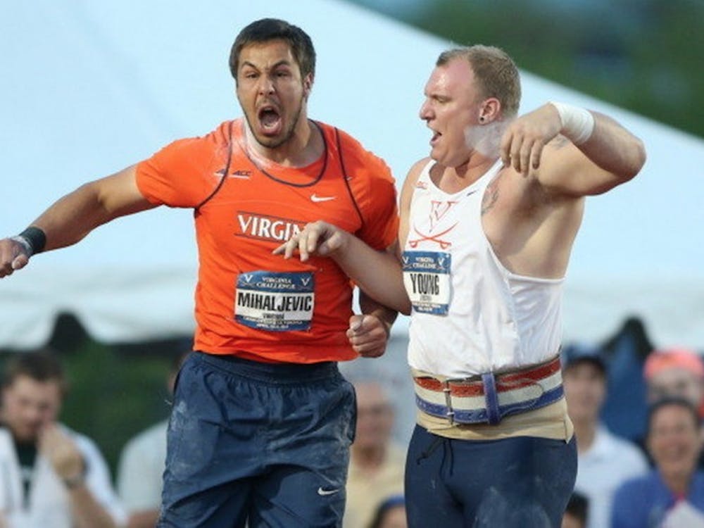 Sophomore throwers Filip Mihaljevic (left) and Jordan Young starred this weekend at Lannigan Field. Mihaljevic became the first Cavalier to exceed the 20-meter mark in the shot put.
