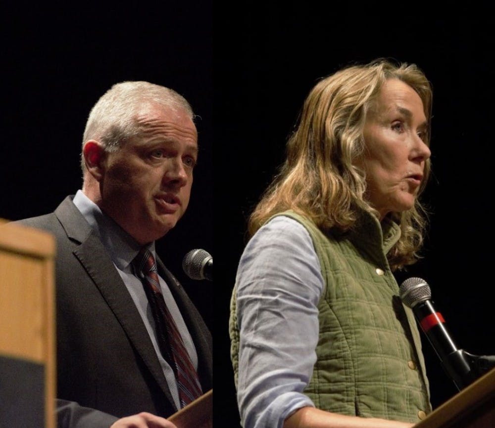 <p>Republican Denver Riggleman (Left) and Democrat Leslie Cockburn (Right) speak during Monday night's debate at Piedmont Virginia Community College.&nbsp;</p>