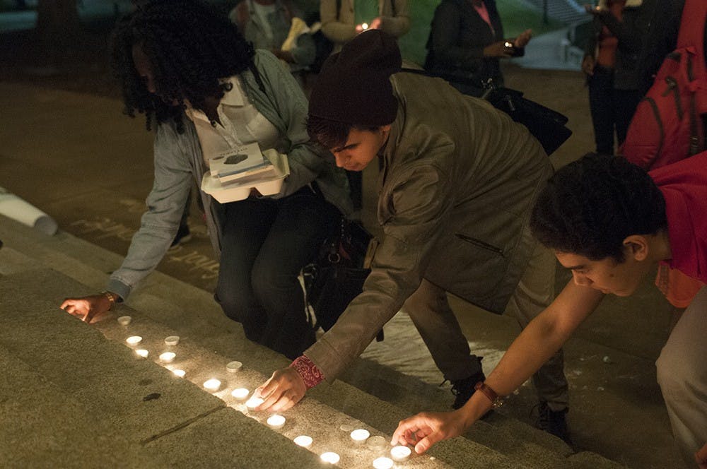 Warren encouraged attendees to say “Asé,” following the mention of each name, the Yoruba word for “I affirm.”