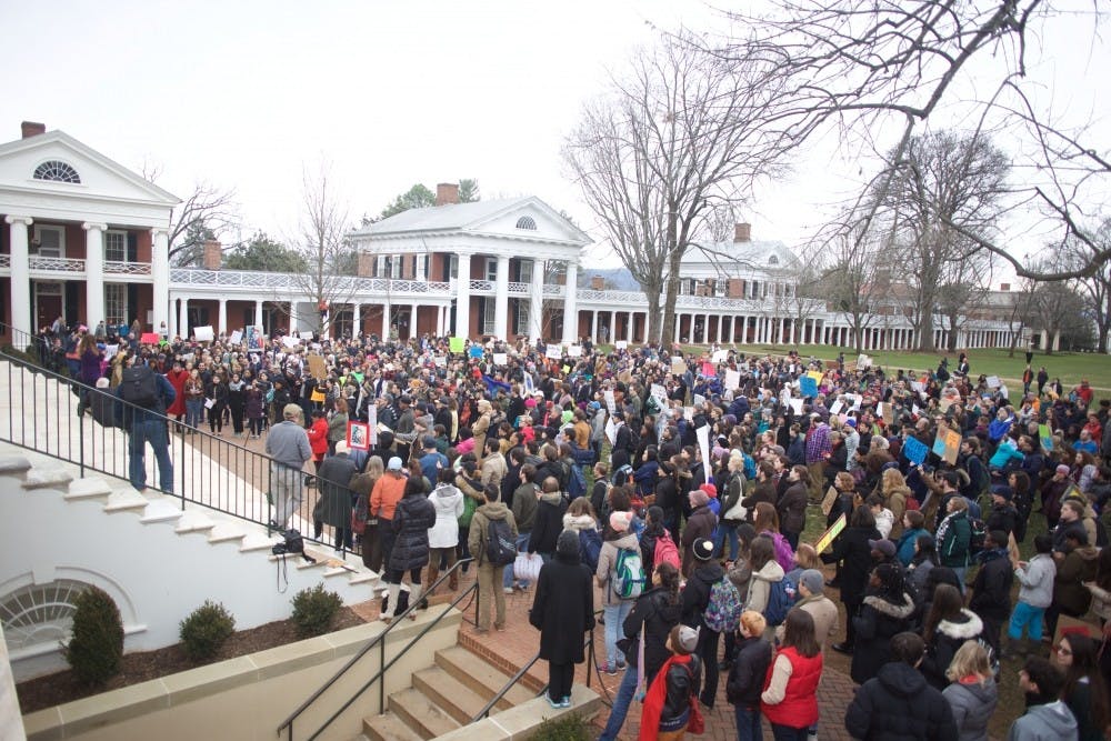 Hundreds gather to protest the Trump immigration ban on the Lawn