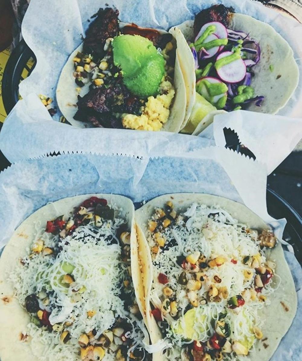 A student instagram account features Brazos Tacos in a post. 