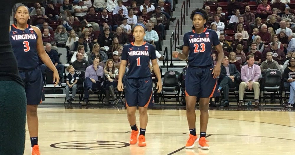 Sophomore guard Brianna Tinsley (center) led Virginia in scoring with a career-high 19 points against Michigan State Wednesday night.