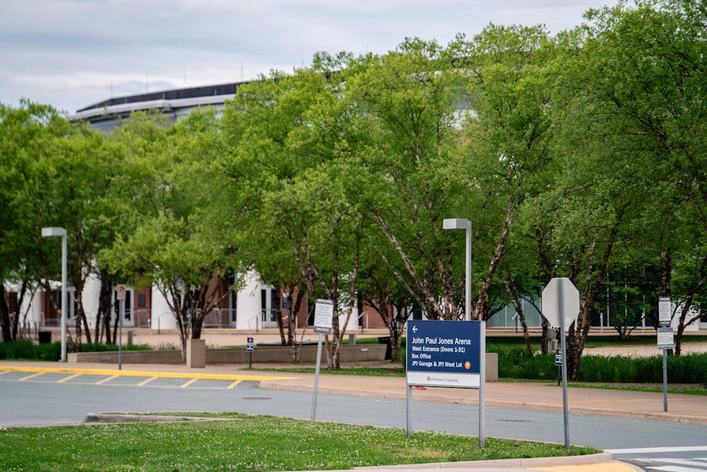 Sign towards the John Paul Jones Arena parking lot, photographed May 20, 2025.