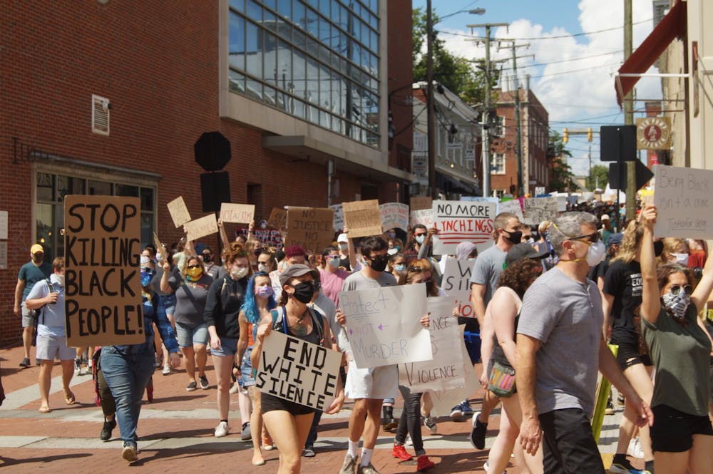 Several hundred protesters converged on downtown Charlottesville Saturday afternoon as part of the nationwide demonstrations to show outrage over the murder of George Floyd. (CD Photo // Sophie Roehse)