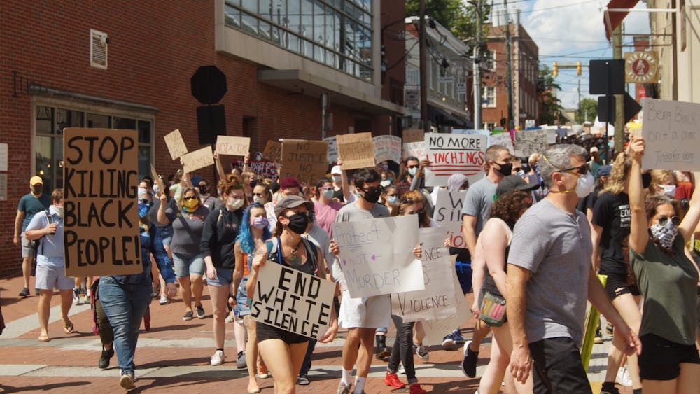 Several hundred protesters converged on downtown Charlottesville Saturday afternoon as part of the nationwide demonstrations to show outrage over the murder of George Floyd. (CD Photo // Sophie Roehse)