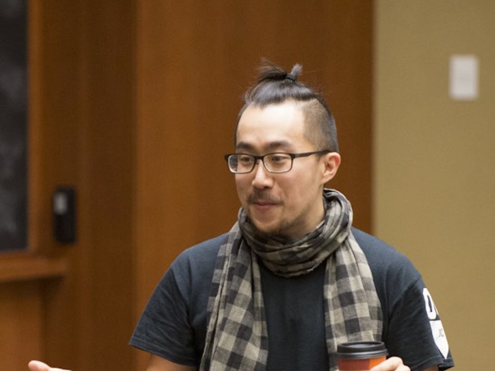 Spoken word poet spoke on the issues being posed for Asian Americans today.