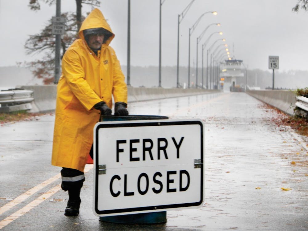 Mike Ferreira (cq), with New Horizon Security, closes the road to the Jamestown Ferry as Hurricane Sandy heads torward the eastern coast Monday, October 29, 2012.