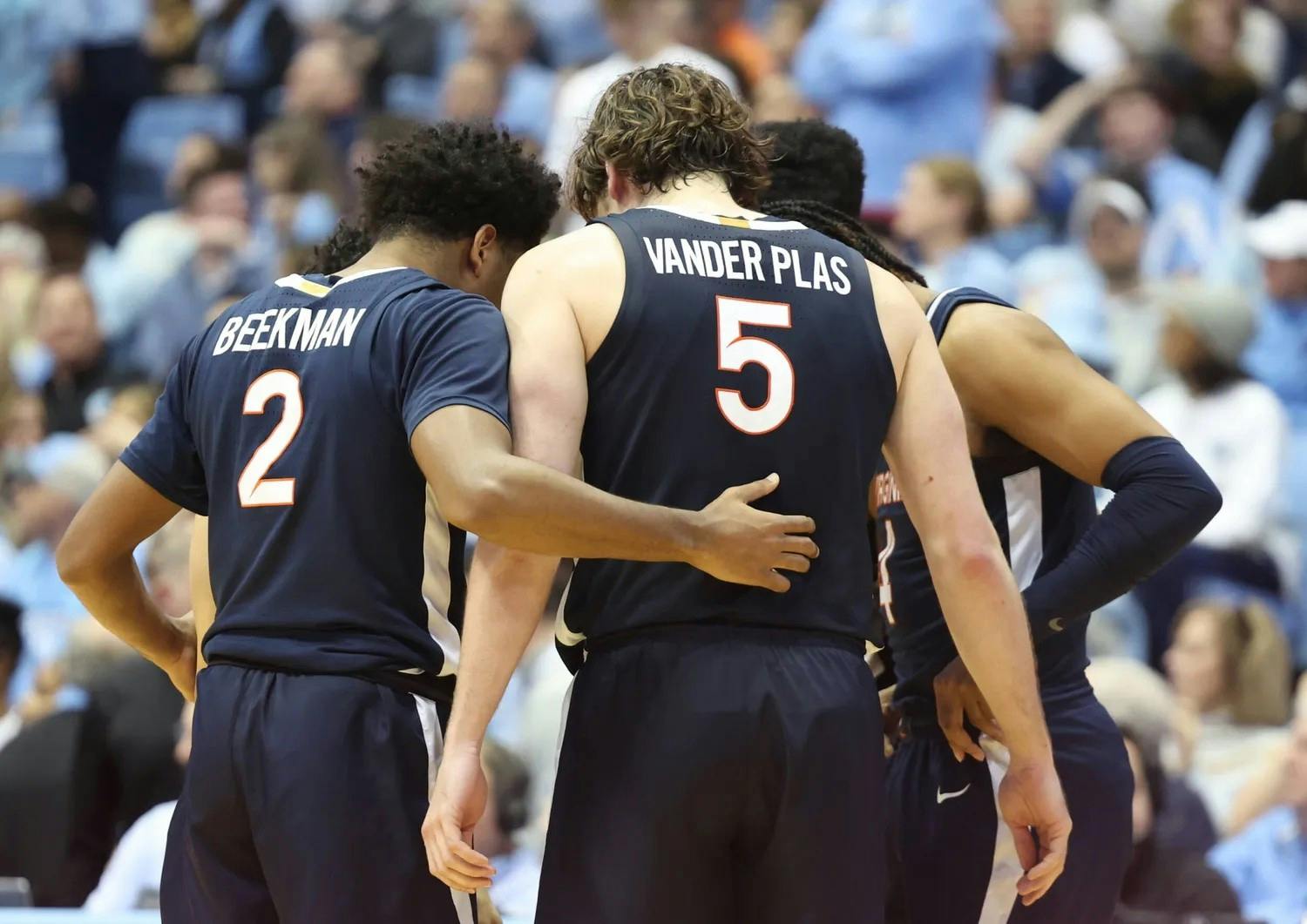 The Cavaliers outscored the Tar Heels in the second half, but their comeback bid fell short