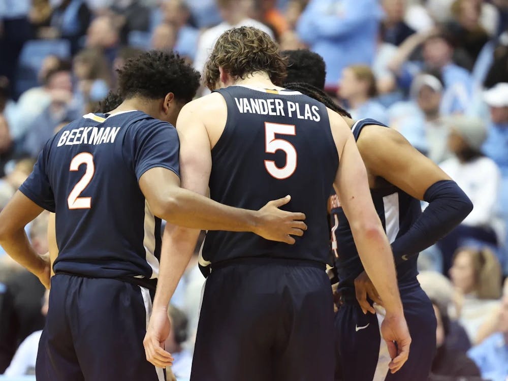 The Cavaliers outscored the Tar Heels in the second half, but their comeback bid fell short