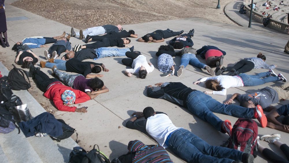 Students participate in a die-in in September 2016 to protest recent police brutality.