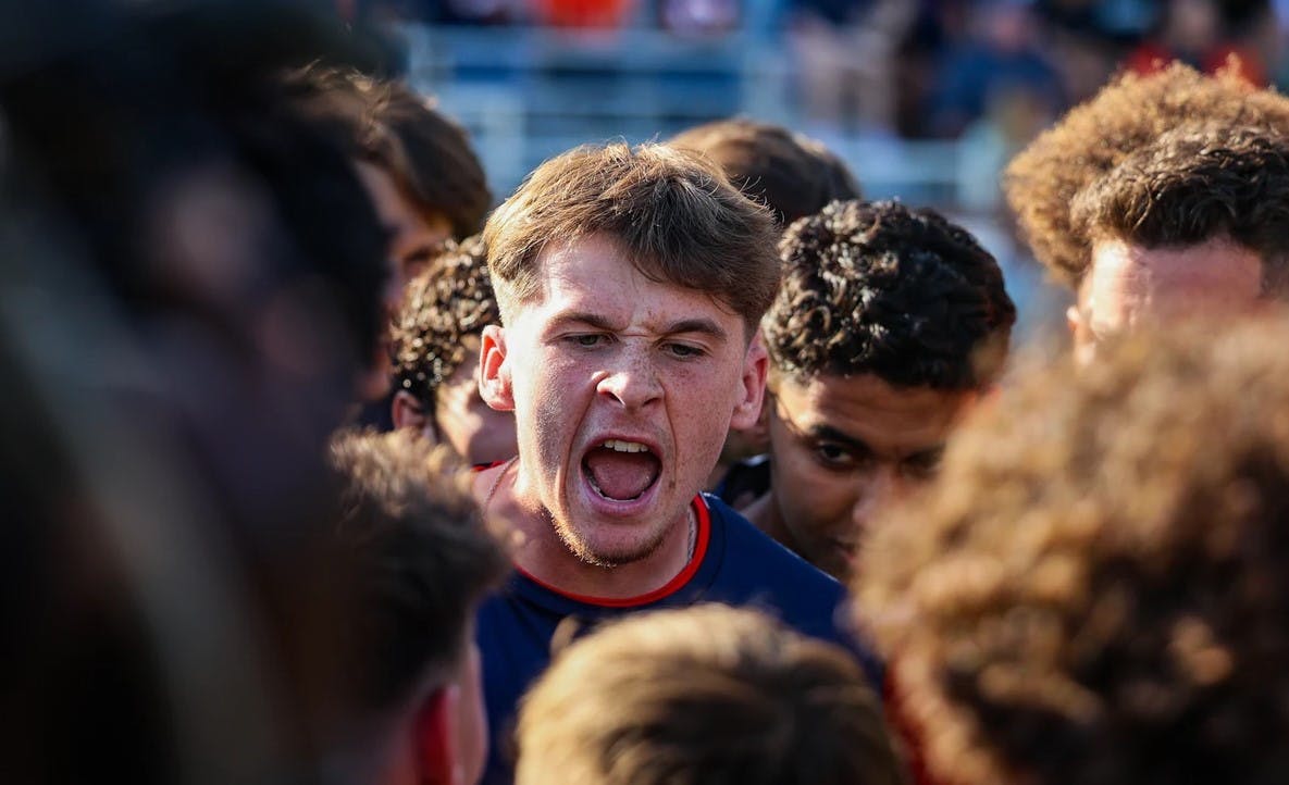Gallagher at the center of the huddle before a game last season against Syracuse.