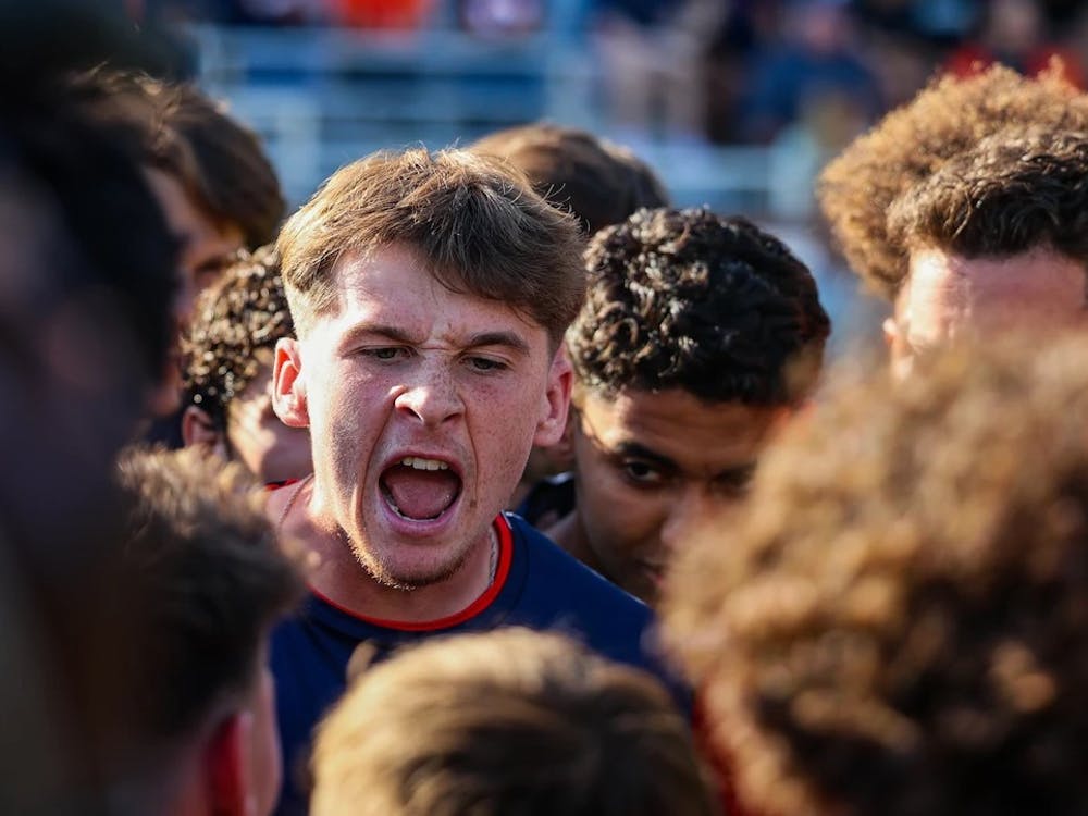 Gallagher at the center of the huddle before a game last season against Syracuse.