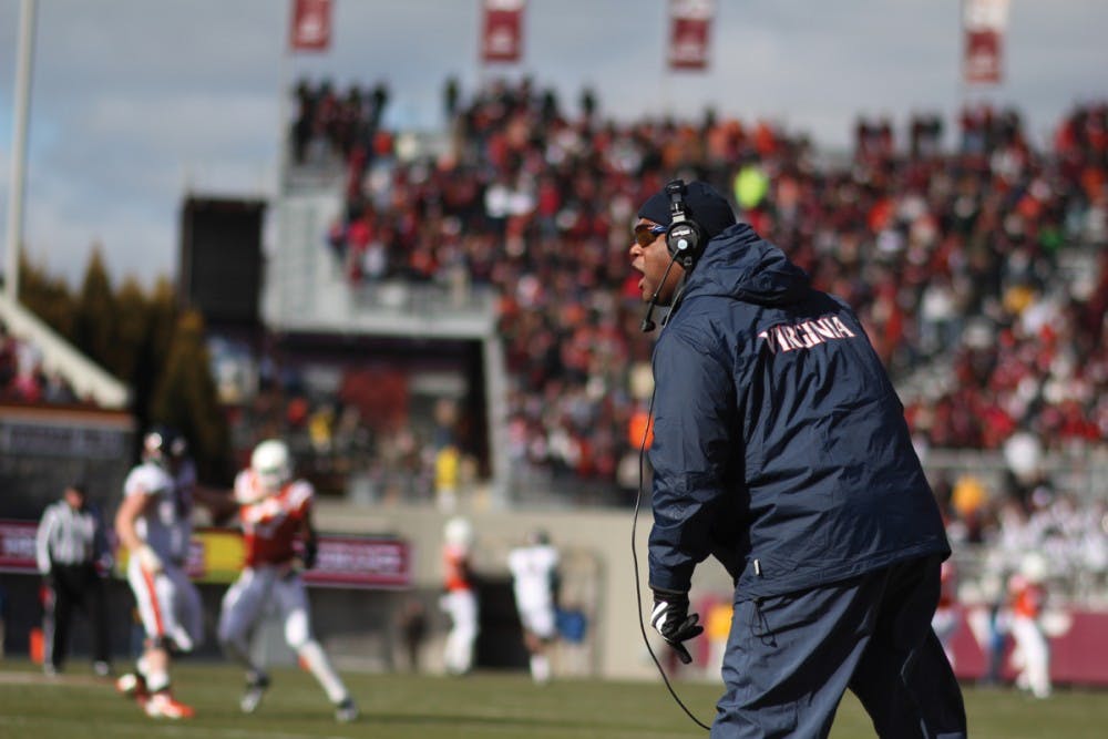 Virginia head coach Mike London yells towards the referee's after a no-call in the second quarter.