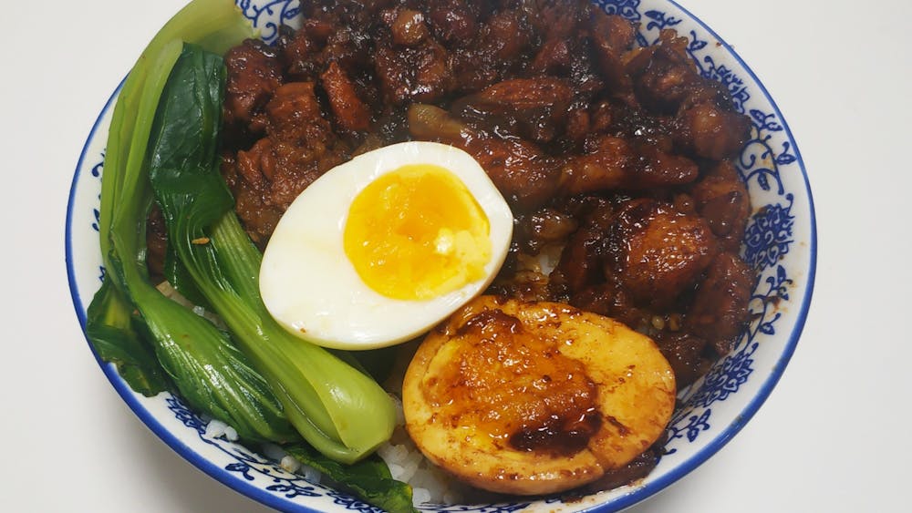 Serve the rice in a bowl, arrange the halved poached eggs and boiled bok choy and pour on the meat and gravy. Your minced pork rice is done!