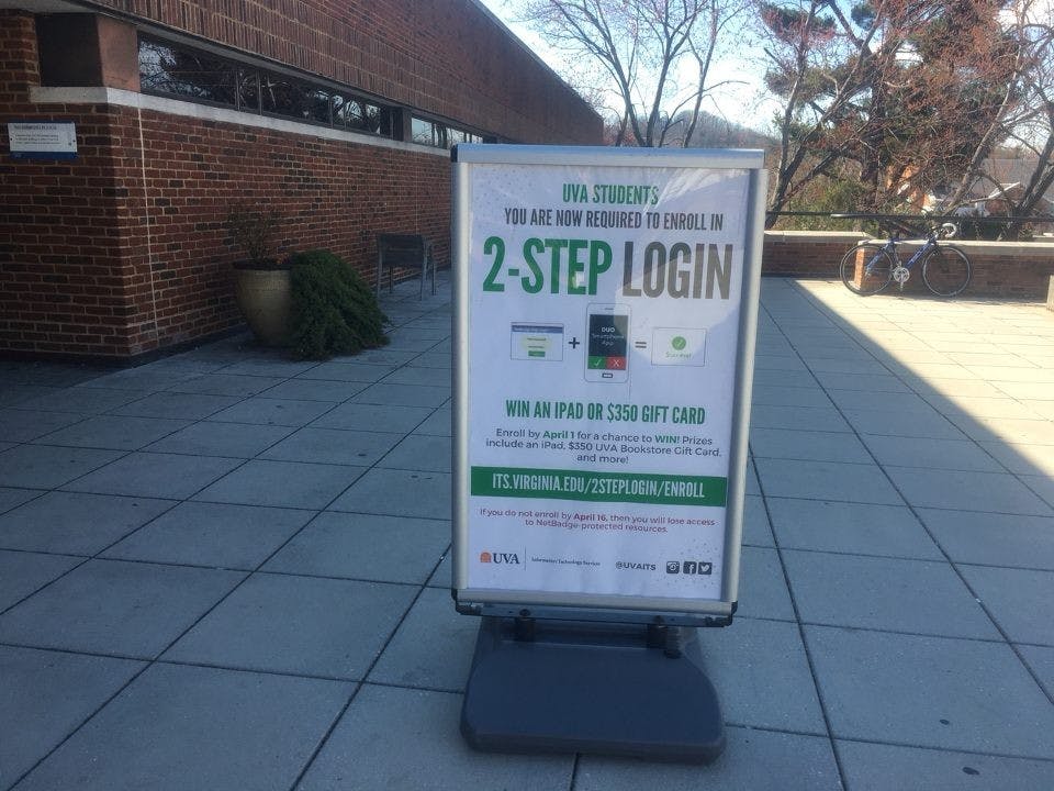 A sign outside Clemons Library with information about the new two-step login