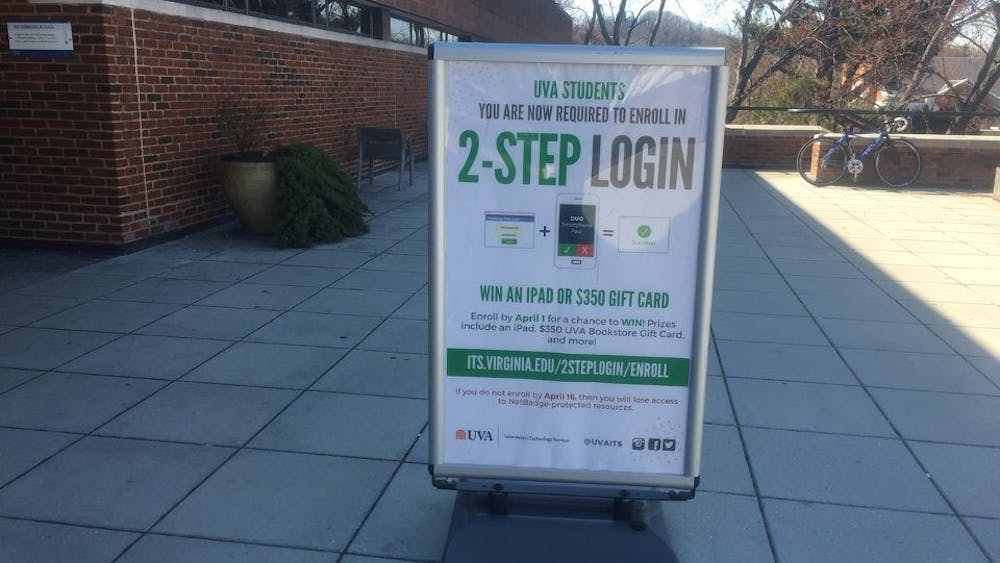 A sign outside Clemons Library with information about the new two-step login