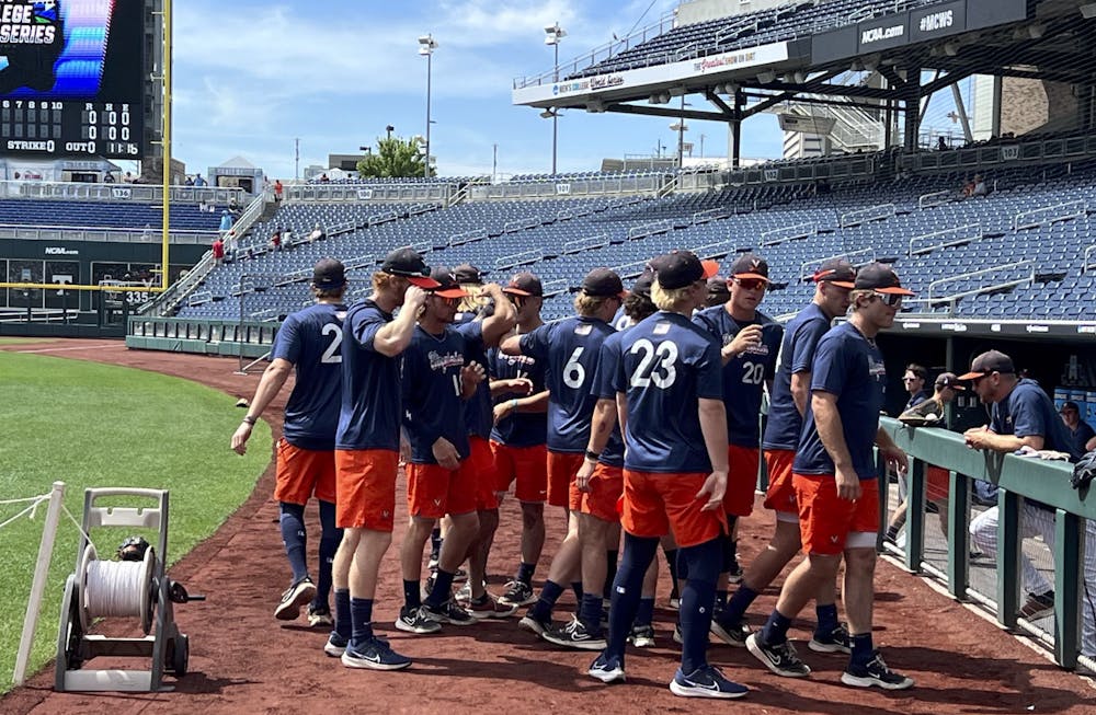 <p>Led by Griff O'Ferrall and Ethan Anderson, the Cavaliers huddled June 15 at the 2024 College World Series.</p>