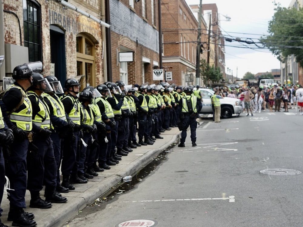 Law enforcement personnel near the Downtown Mall on the anniversary of the Unite the Right rally on Aug. 12, 2018.