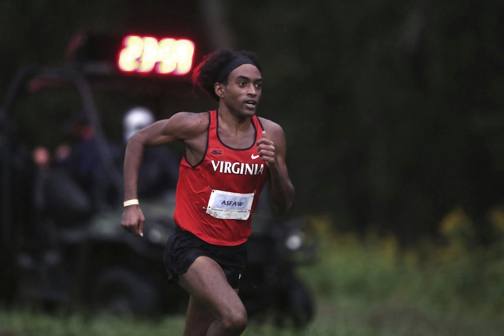 <p>Senior Rohann Asfaw led Virginia on the men’s side, running the fastest 8K of the meet.</p>