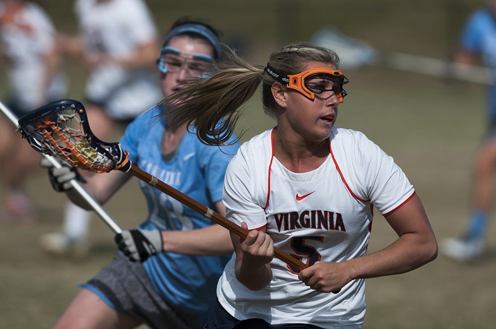 Sophomore attacker Kelly Reese scored three goals in seven minutes in the second half, but Virginia lost for the ninth consecutive time against the Wildcats. 