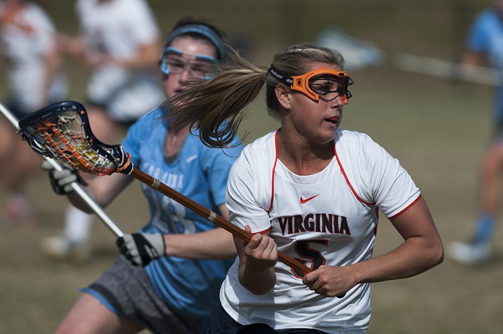 <p>Sophomore attacker Kelly Reese scored three goals in seven minutes in the second half, but Virginia lost for the ninth consecutive time against the Wildcats. </p>