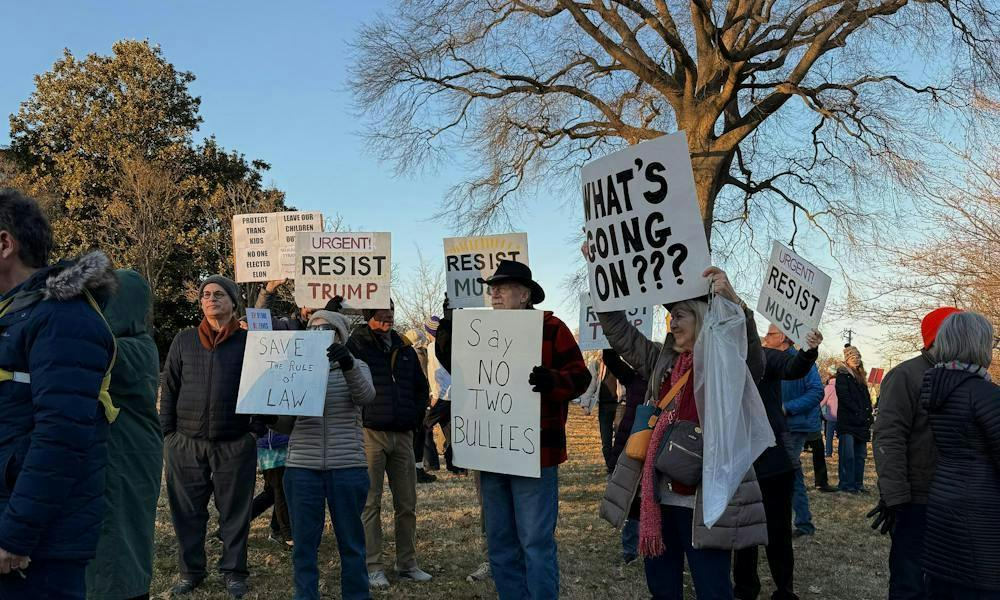 Individuals rallying against President Donald Trump Sept. 22, 2026.
