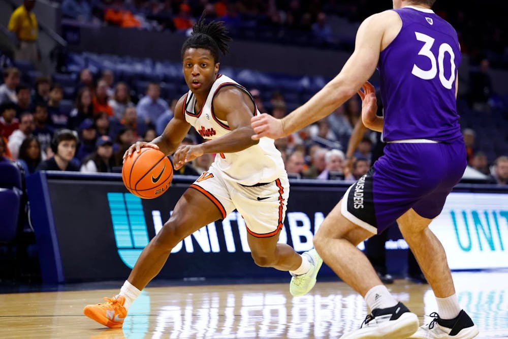 <p>Sophomore guard Dai Dai Ames attacks off the dribble.</p>