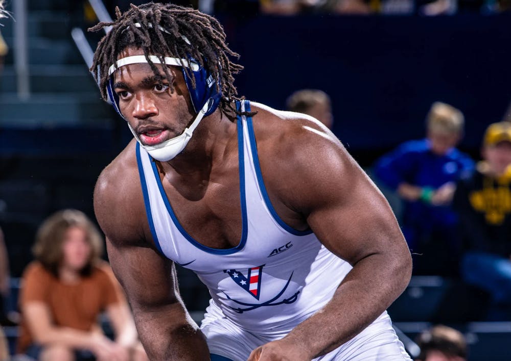 <p>Virginia won the first three weight classes and held the lead through nine bouts, but a late pin swung the momentum and ultimately decided the dual.</p>