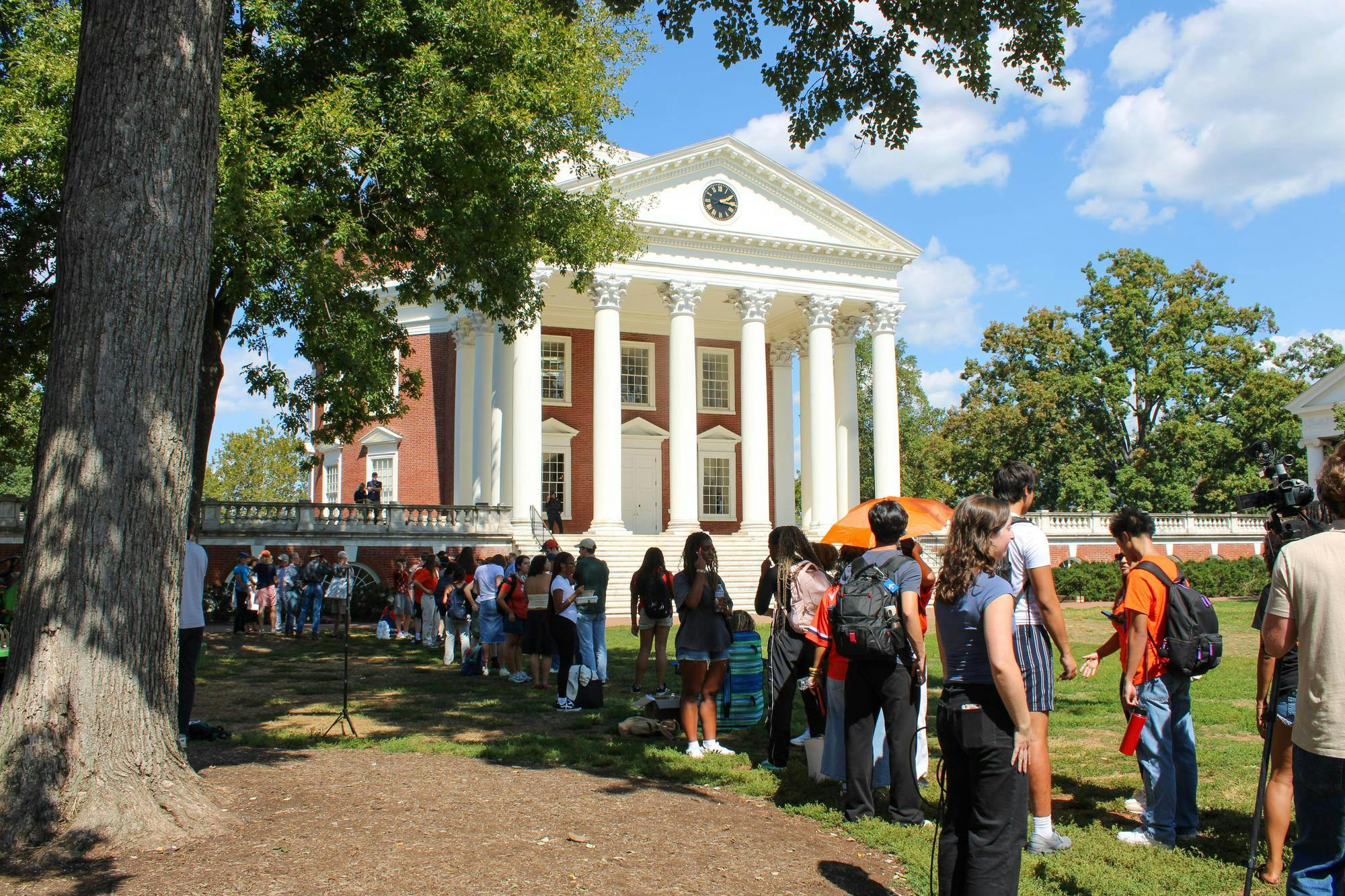 Dozens of protesters wait in line to enter the full Board of Visitors meeting — which reached capacity — Sept. 12, 2025.