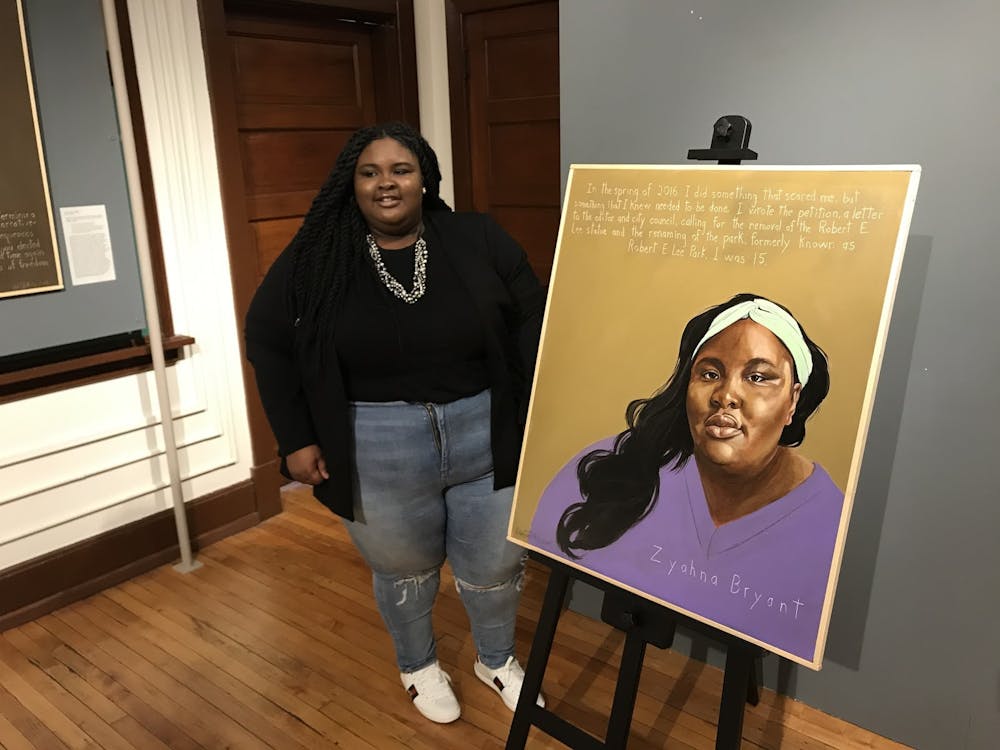 &nbsp;Zyahna Bryant unveiled artist Robert Shetterly’s portrait of her during the event and read the inscription: “...I wrote the petition… calling for the removal of the Robert E. Lee statue and the renaming on the park, formerly known as Lee Park. I was 15.” The portrait hangs beside Shetterly’s painting of Sojourner Truth. &nbsp;