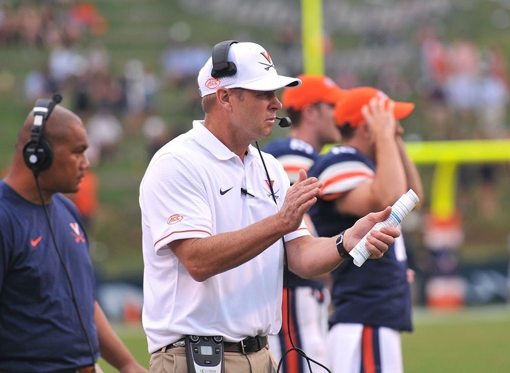 <p>Coach Bronco Mendenhall is one of several coaches who have engineered program turnarounds for Virginia sports this decade.</p>