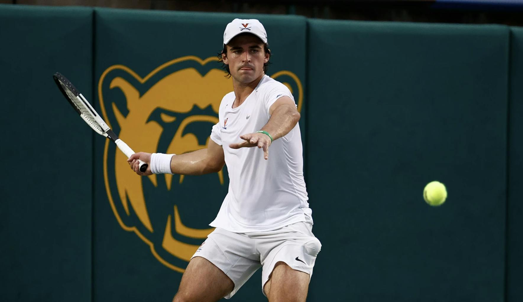James Hopper winds up for a forehand during the quarterfinal match.