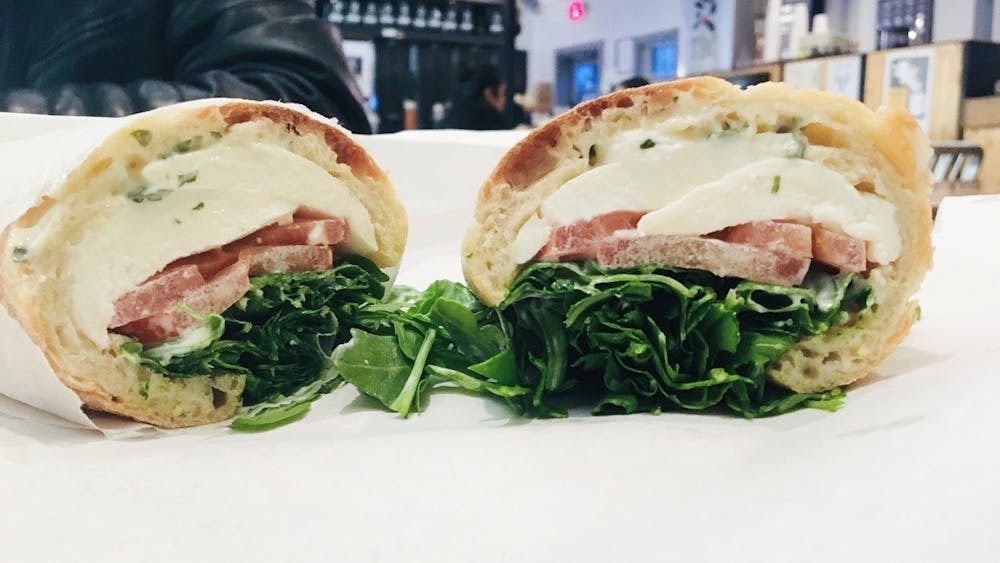 "I ordered the K.I.S.S. sandwich and I was thoroughly impressed. The ingredients were simple but worked well together — fresh mozzarella, tomato, arugula and basil mayo served on a baguette."