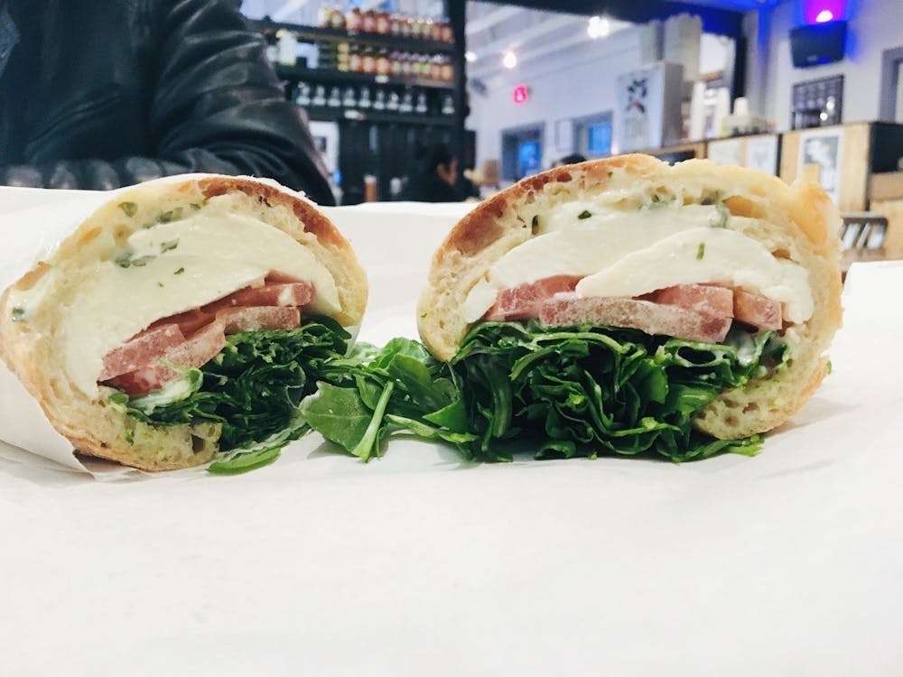 "I ordered the K.I.S.S. sandwich and I was thoroughly impressed. The ingredients were simple but worked well together — fresh mozzarella, tomato, arugula and basil mayo served on a baguette."