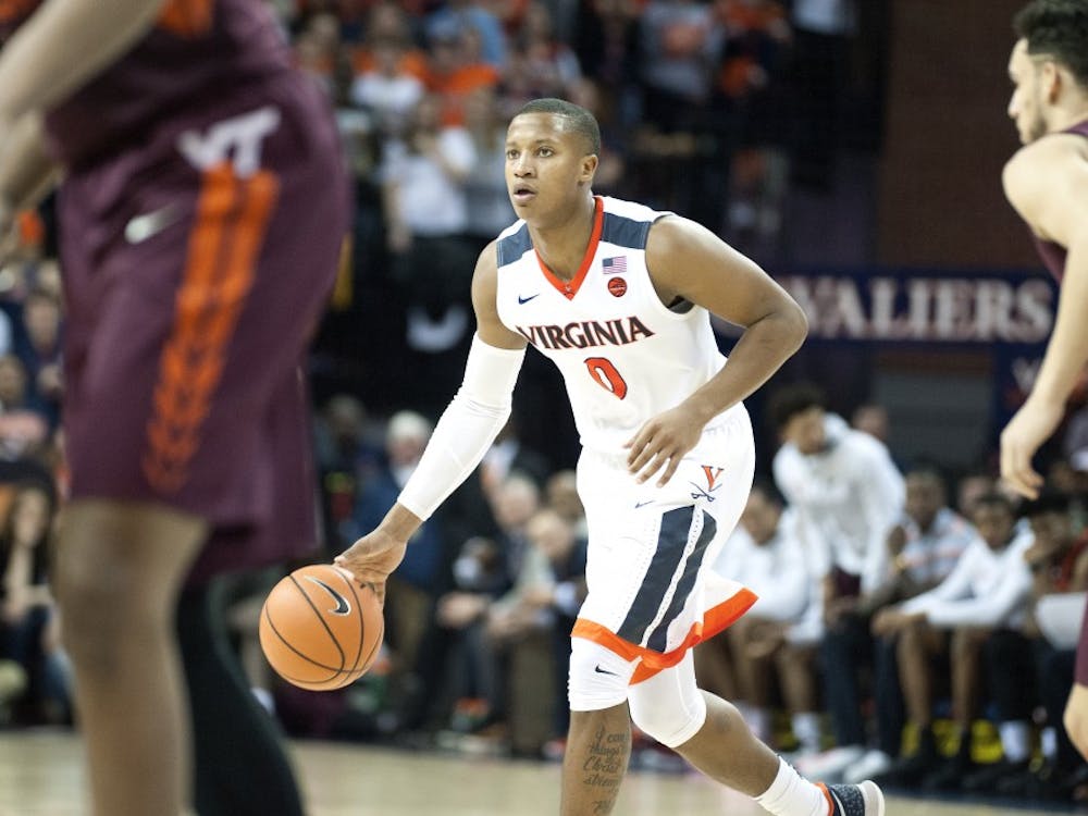 Virginia senior guard Devon Hall will try to help his team get back on track against Miami Tuesday night.
