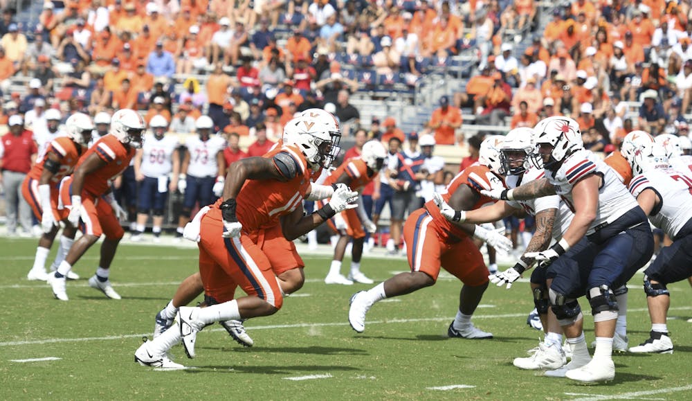 Virginia's defense attacks in a victory against Richmond September 3, 2022.