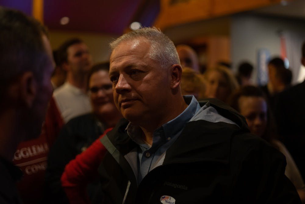 <p>Republican Denver Riggleman speaks with supporters Tuesday night at the Blue Mountain Brewery after delivering his victory speech.&nbsp;</p>