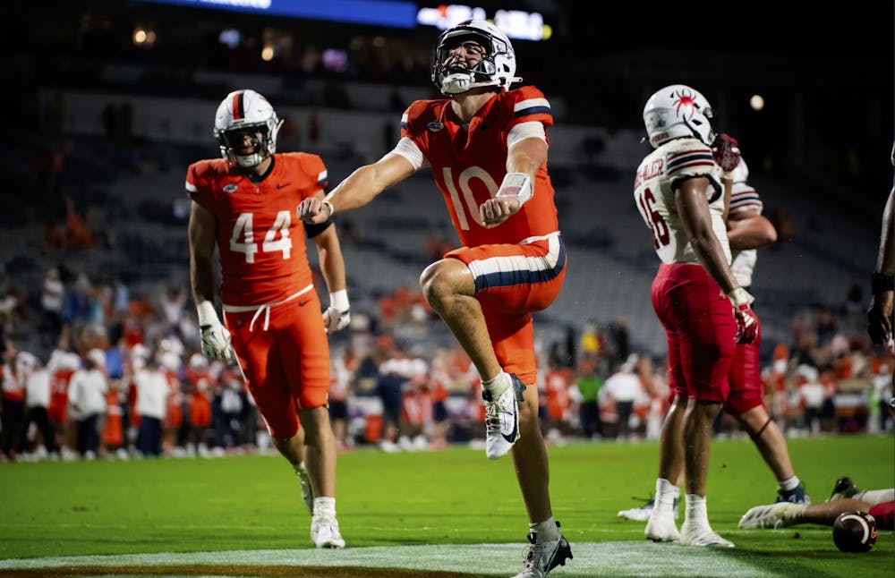 Sophomore quarterback Anthony Colandrea flexes after an exciting touchdown.