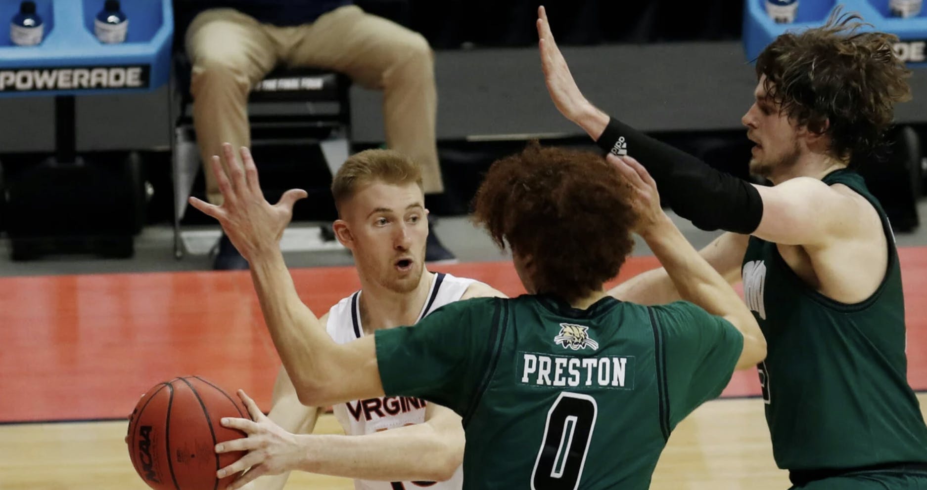 Sam Hauser looks frantically for a way to escape a double team.