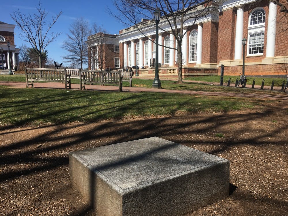 A few feet away from the Berlin Wall outside of Alderman library is an inconspicuous memorial to the University’s anatomical theater.
