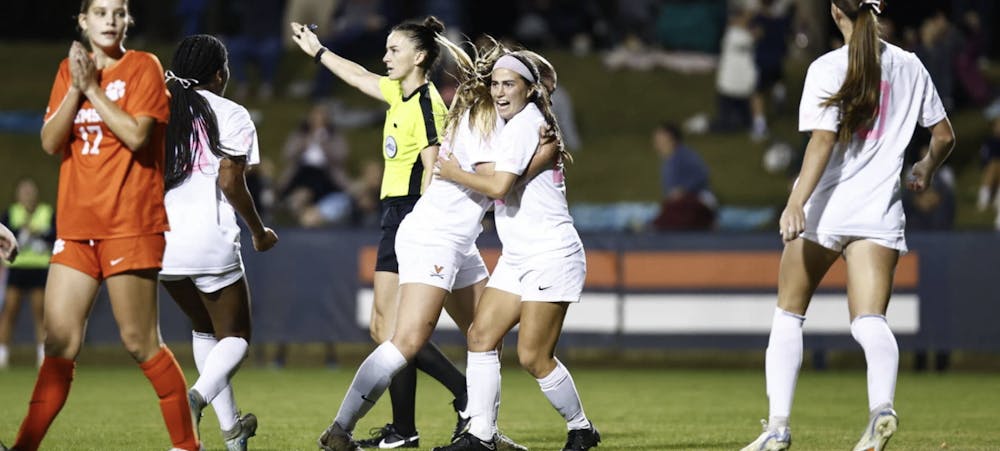 <p>Senior midfielder Lia Godfrey celebrates her game-winning goal Friday night.</p>