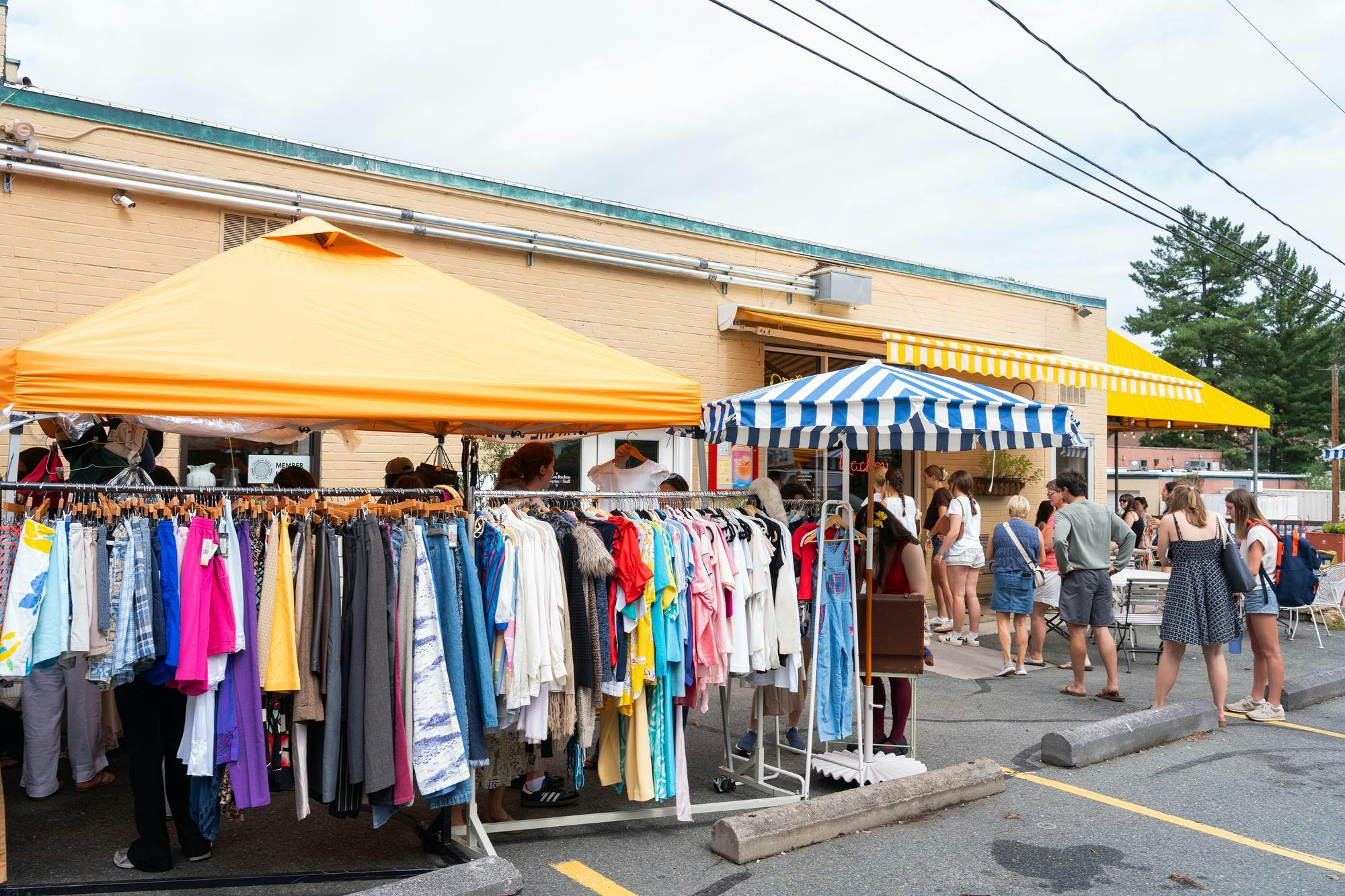 For a few hours on a gray weekend, a folding rack of secondhand clothes and a bakery’s open kitchen were enough to pull together strangers who might not otherwise cross paths.
