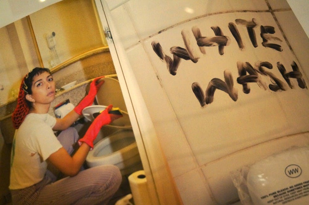 "White Wash," a page from the magazine "Indigenous Woman" by Martine Gutierrez, pictured here on display in the Fralin.