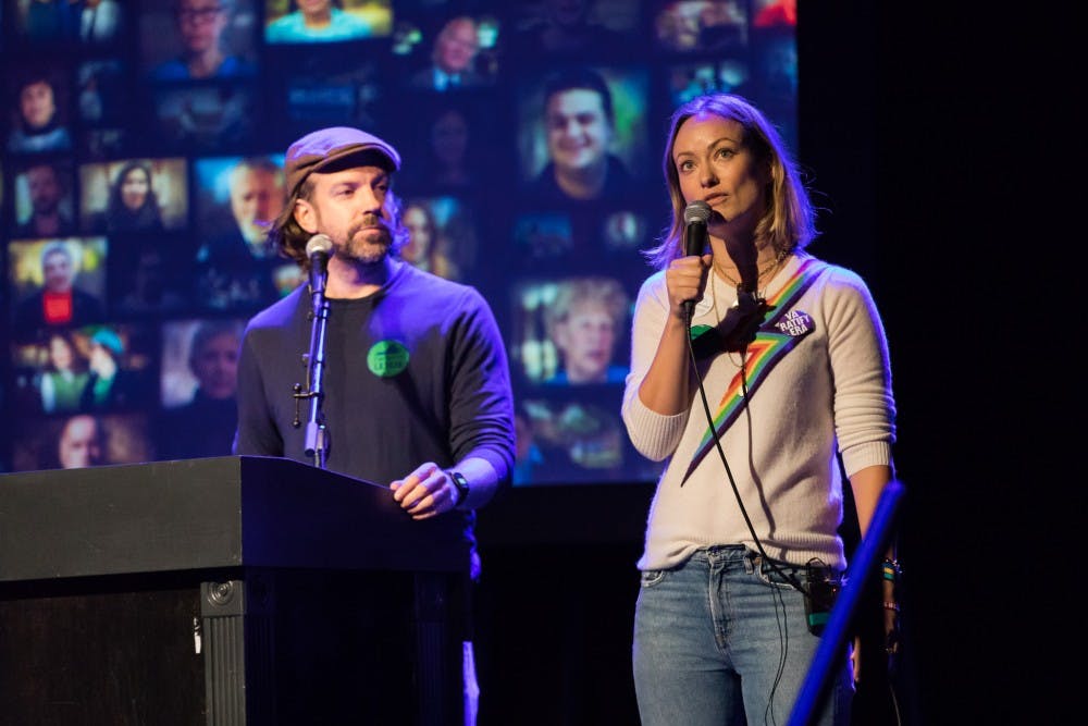 Actress Olivia Wilde (right) is Cockburn's daughter and actor Jason Sudeikis (left) is Wilde's fiancé.&nbsp;