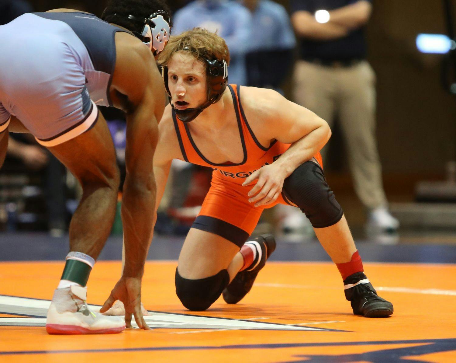 No. 23 graduate student Brian Courtney prepares to face off against his opponent on Friday.