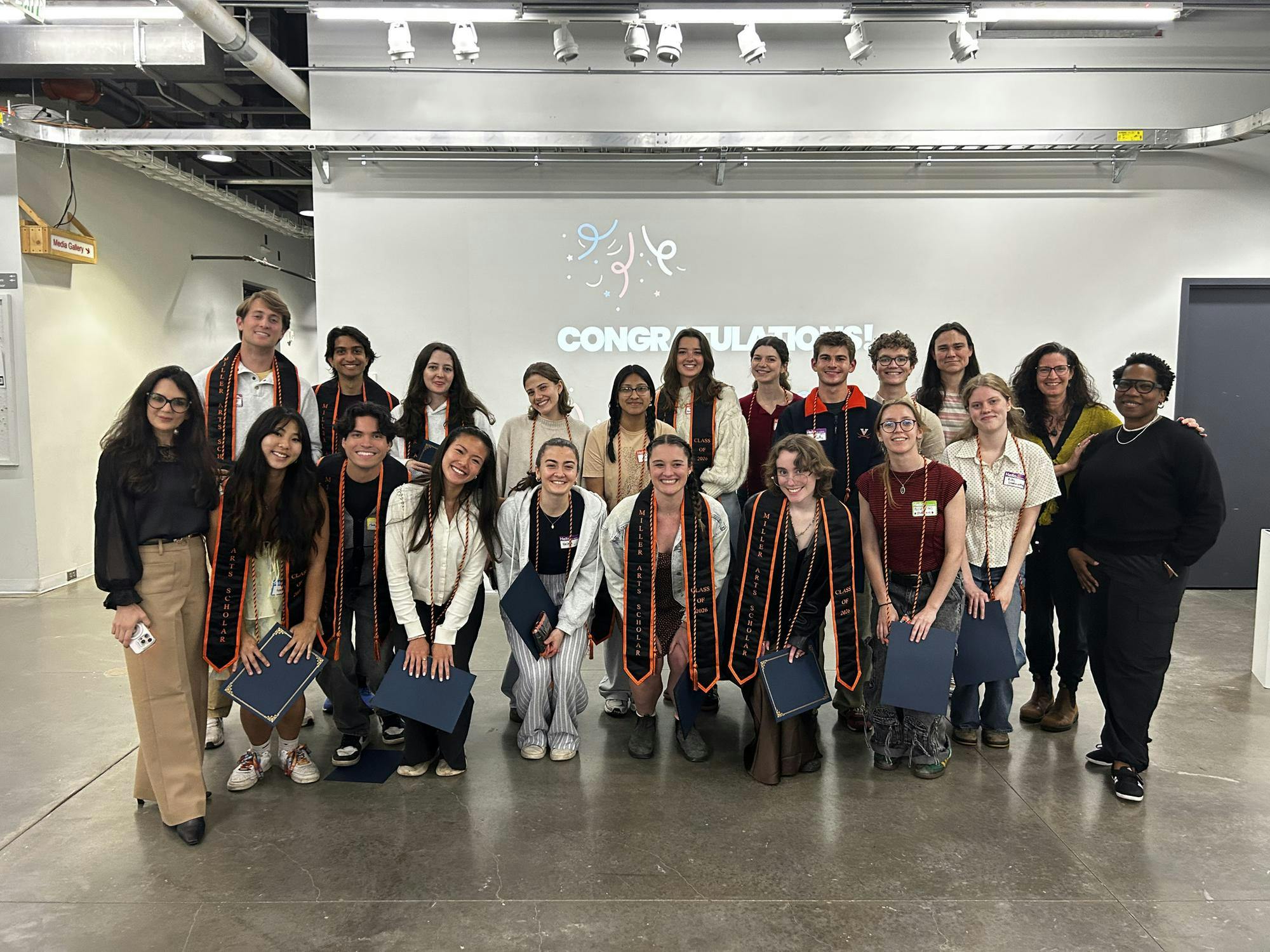 The 18 graduating scholars received their stoles and certificates as recognition for their completion of the program April 29