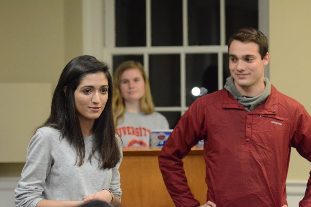 <p>Maria Tahamtani, (left) a third-year College student and the president of BiHOOphilic at U.Va., and Daniel Brooks (right) a third-year College student and the vice president of BiHOOphilic at U.Va., spoke in support of their organization.&nbsp;</p>